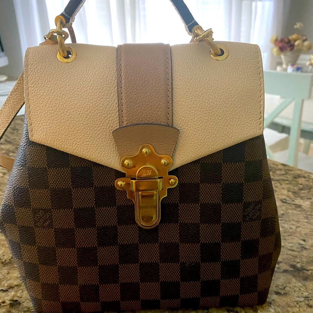 Louis Vuitton Damier Ebene Clapton Backpack. I love her dearly but need $